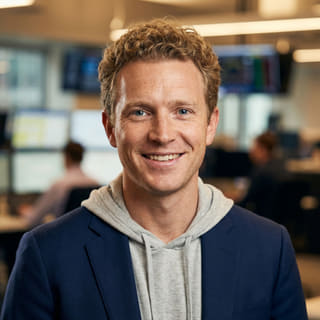 Ryan Brooks, listed as Lead Trading Analyst at Comet Wertode, in a profile image